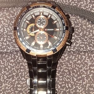Curren Black and gold wrist watch